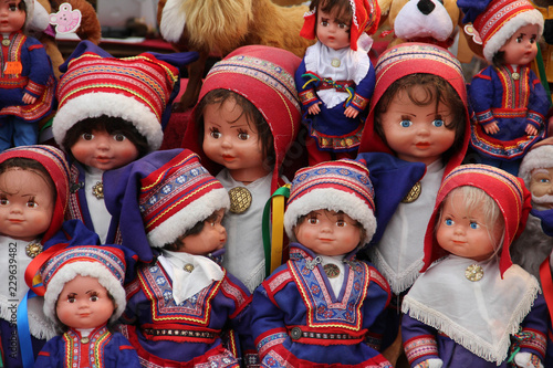 A collection of Saami dolls dressed in traditional Lapland clothing, sold as souvenirs in Finland.