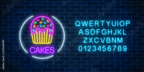 Neon glowing sign of cake with glaze in circle frame with alphabet. Fastfood light billboard symbol. Cafe menu item.