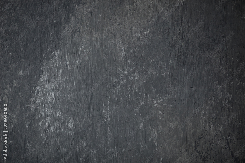 Naklejka premium textured dark grey background wall plaster