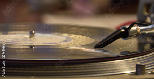 close up shot of turntable playing an lp