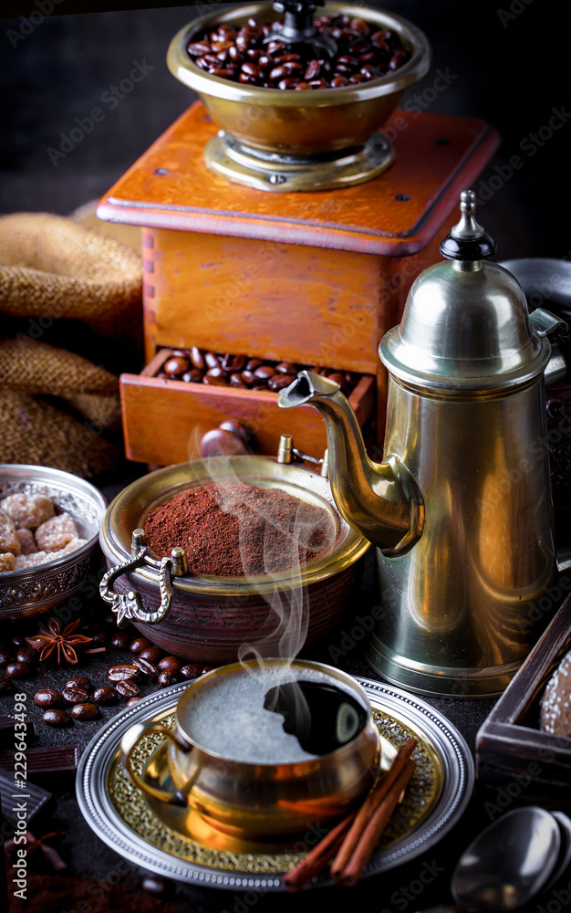 Black coffee in a cup on old background Black coffee in a cup on old background