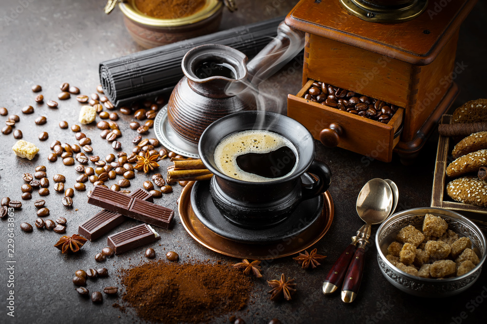 Black coffee in a cup on old background Black coffee in a cup on old background