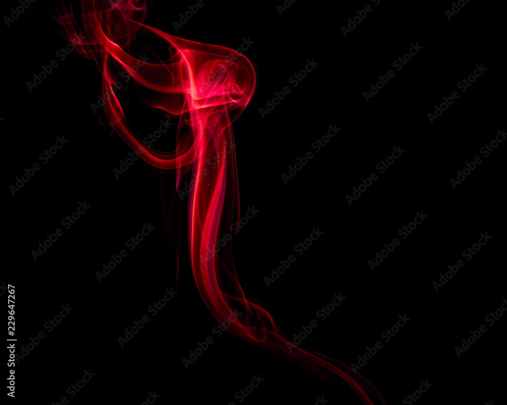 Red smoke on black background Red smoke on black background