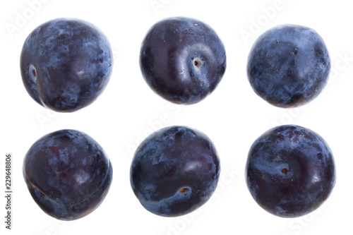 plums isolated on a white background. Top view. Flat lay pattern. Set or collection