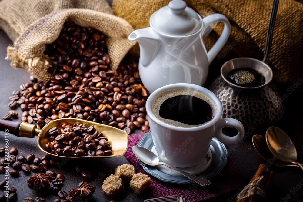 Black coffee in a cup on old background Black coffee in a cup on old background