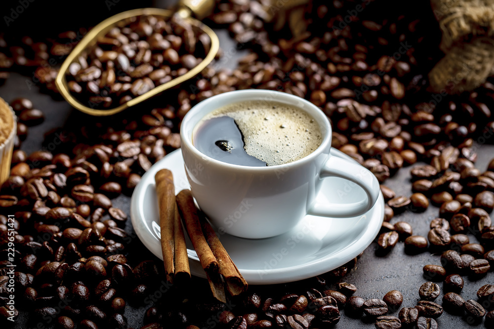 Fototapeta premium Black coffee in a composition with kitchen accessories