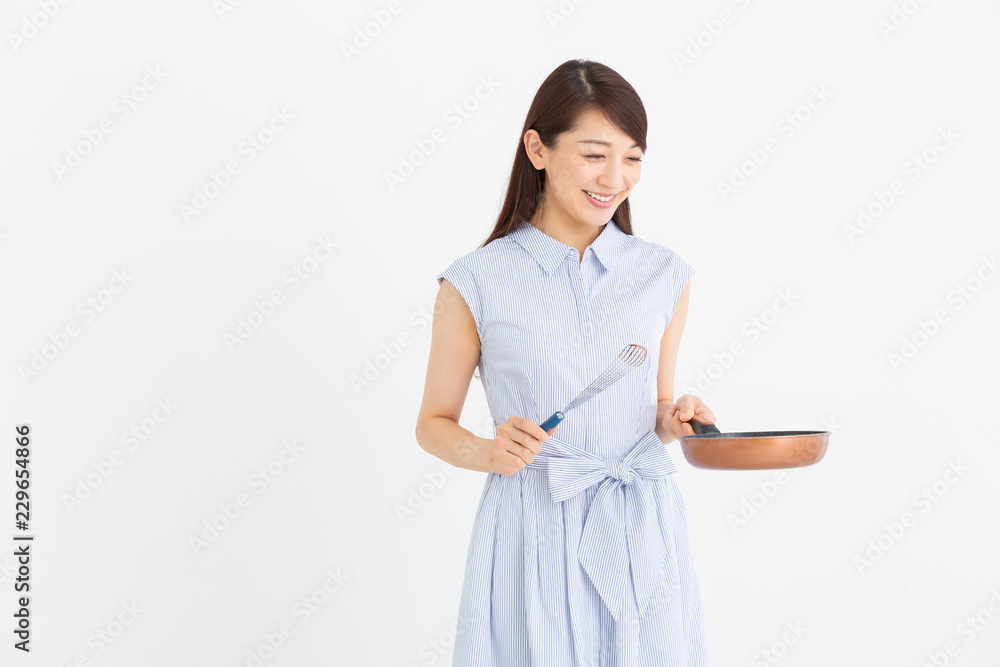 料理をする女性