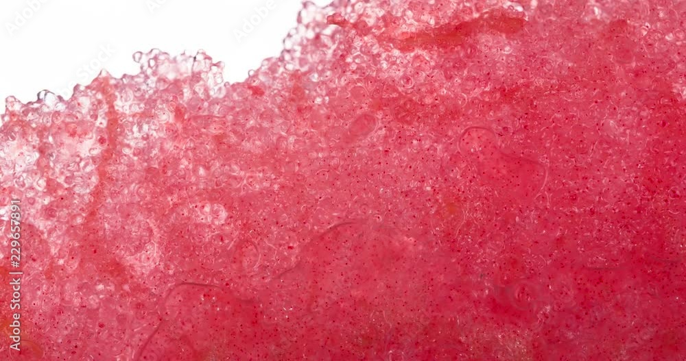 Squeeze Juicy Watermelon Slice. Slices and slices of watermelon are compressed and crushed close-up on a bright white background, creating a juicy splash of pulp and juice. Shooting at 120 fps Squeeze Juicy Watermelon Slice. Slices and slices of watermelon are compressed and crushed close-up on a bright white background, creating a juicy splash of pulp and juice. Shooting at 120 fps