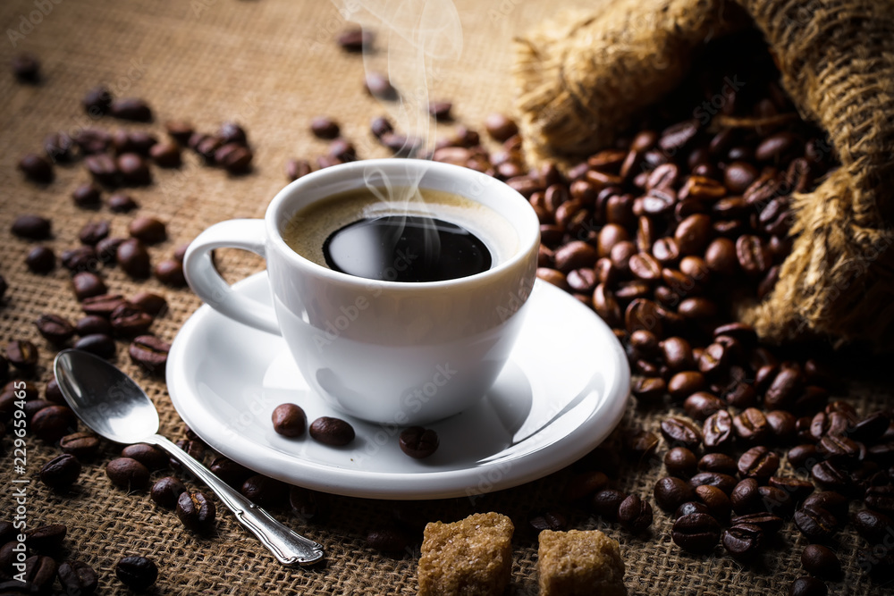 Fototapeta premium Black coffee on old background