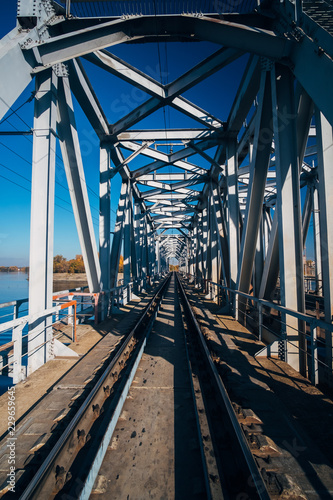 Fototapeta Naklejka Na Ścianę i Meble -  Railway track on steel railway bridge over Voronezh river
