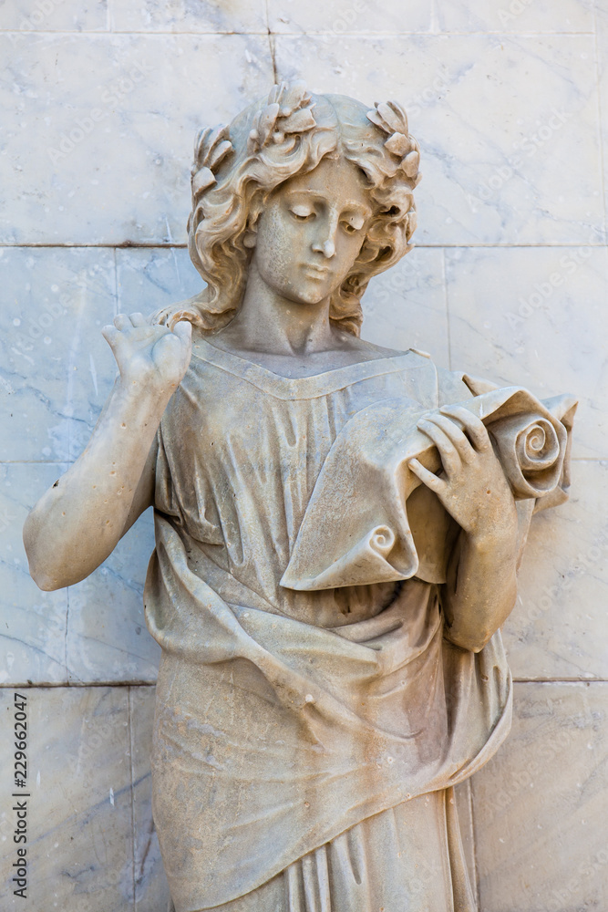 Obraz premium Calliope muse statue at the facade of the Adolfo Mejia theater in Cartagena de Indias