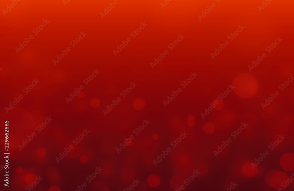 Christmas background with light bokeh on red background.