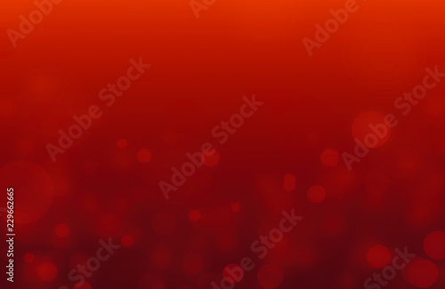 Christmas background with light bokeh on red background.