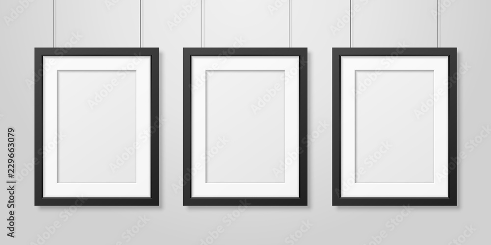 Three Vector Realistic Modern Interior Black Blank Vertical A4 Wooden Poster Picture Frame Set Hanging on the Ropes on White Wall Mock-up. Empty Poster Frames Design Template for Mockup, Presentation