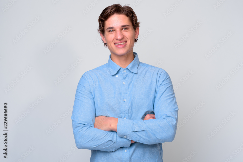 Portrait of young handsome businessman with wavy hair Portrait of young handsome businessman with wavy hair