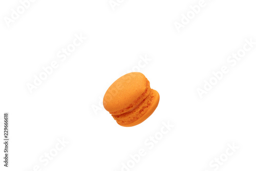 Orange macaroon isolated on white background photo