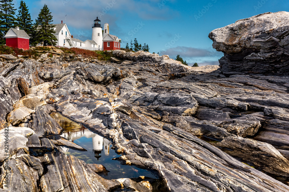 Pemaquid Point Light. The Pemaquid Point Light is a historic US lighthouse located in Bristol, Lincoln County, Maine, at the tip of the Pemaquid Neck. Pemaquid Point Light. The Pemaquid Point Light is a historic US lighthouse located in Bristol, Lincoln County, Maine, at the tip of the Pemaquid Neck.