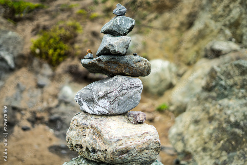 Lands End, San Francisco, United States: March 24, 2018 - People keeps coming here to put the stones together to build some special artwork. Lands End, San Francisco, United States: March 24, 2018 - People keeps coming here to put the stones together to build some special artwork.