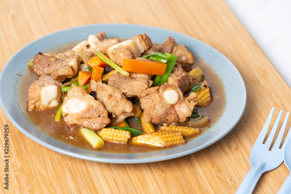 Pork spare rib stir fried with soy sauce and black pepper Pork spare rib stir fried with soy sauce and black pepper