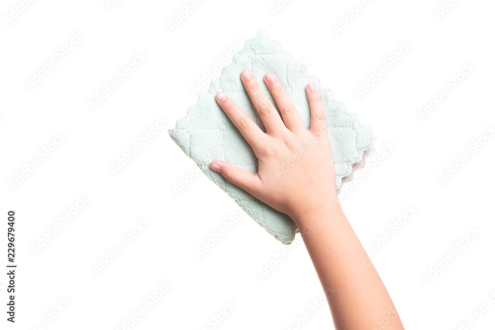 Kid hand cleaning spot from surface with table wipes isolated on white Kid hand cleaning spot from surface with table wipes isolated on white