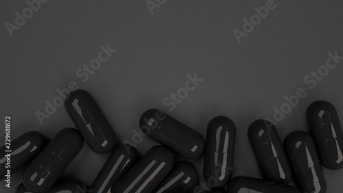 Pile of black medicine capsules