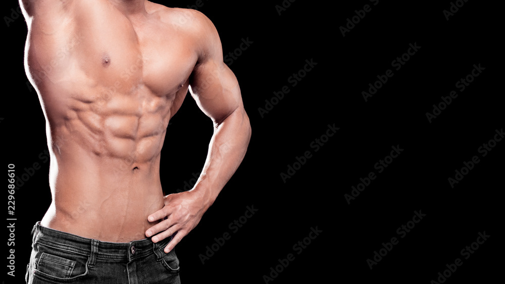 Strong Athletic Man muscular body, torso six pack abs, perfect male abdominal muscles close up. Sport, bodybuilding, crossfit concept.