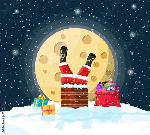 Santa claus with bag with gifts in house chimney