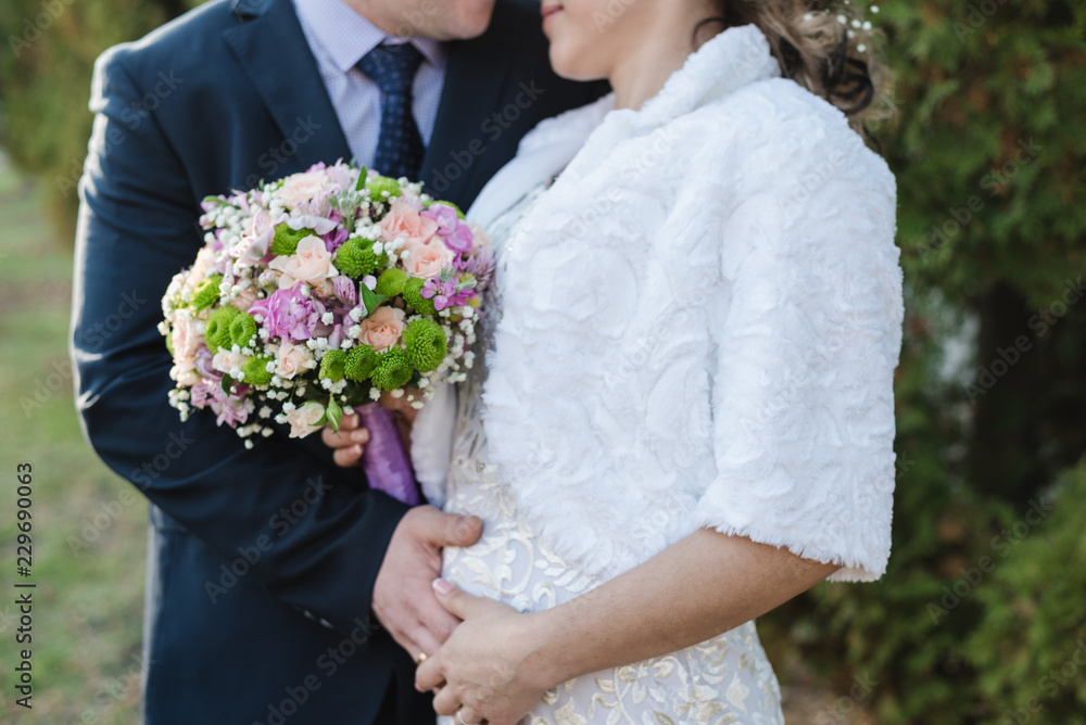 bride holds a bouquet, the bride's bouquet, bride and groom, wedding day bride holds a bouquet, the bride's bouquet, bride and groom, wedding day