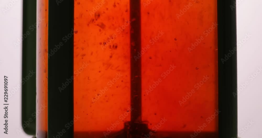 Black tea brewing, leaves swirling in a glass pot Black tea brewing, leaves swirling in a glass pot