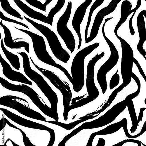 Brush painted zebra seamless pattern. Black and white stripes grunge background.