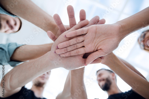 Multiracial Group of Friends with Hands in Stack