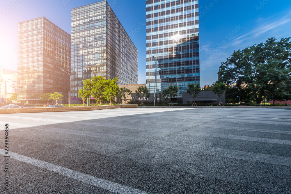 Panoramic skyline and modern business office buildings with empty road,empty concrete square floor