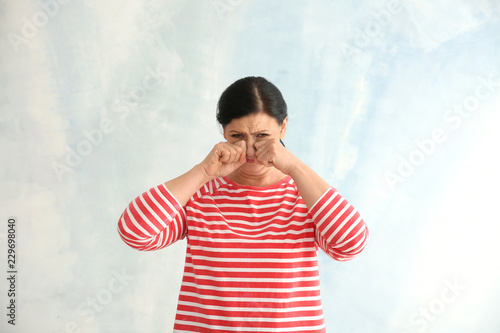 Portrait of crying mature w...
