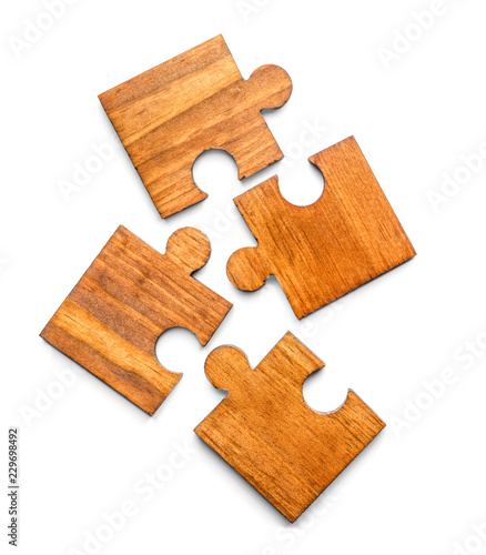 Pieces of wooden puzzle on ...
