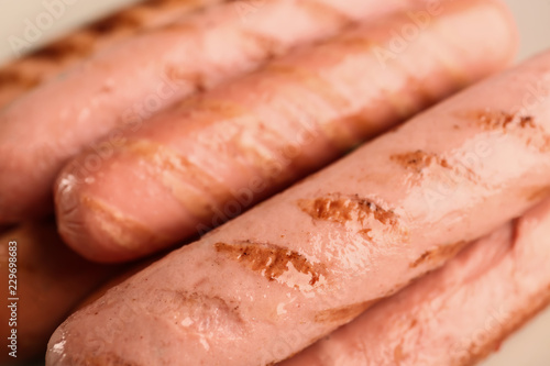 Delicious grilled sausages, closeup