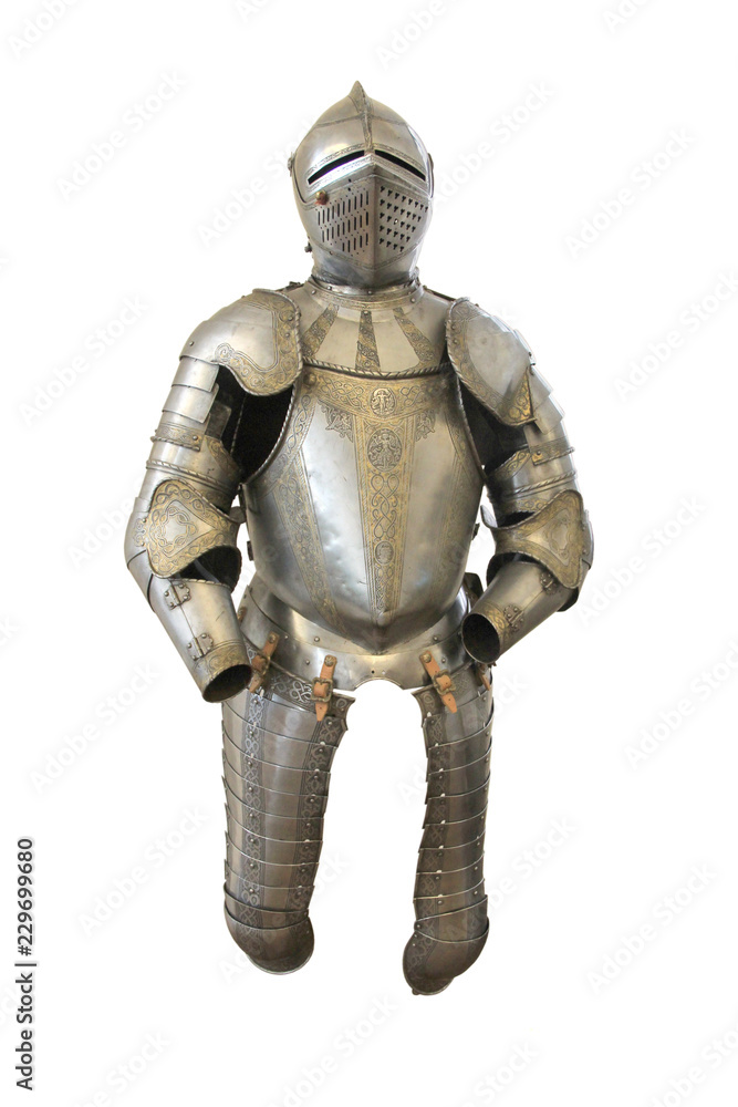 Metal helmet and armor of a medieval knight on a white background