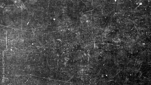 Texture of dark vintage surface with white scratches