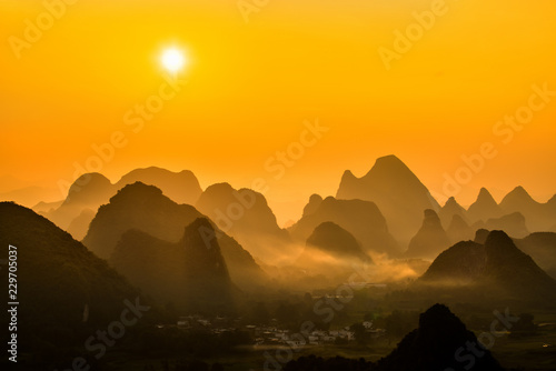Fotografia, Obraz Sunrise Landscape of Guilin , Li River and Karst mountains called Xingping