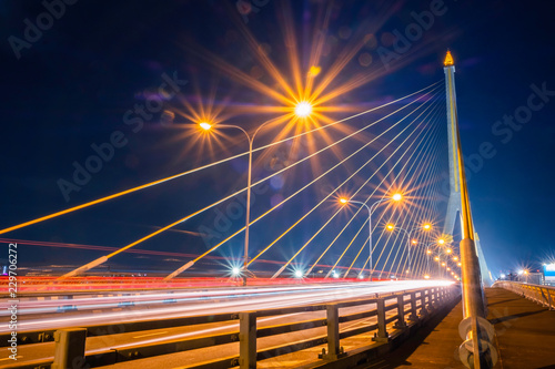 Landscape Rama 8 Bridge at night. a bridge across the Chao Phraya River. In Bangkok Thailand. It is a beautiful place and a landmark of the country.