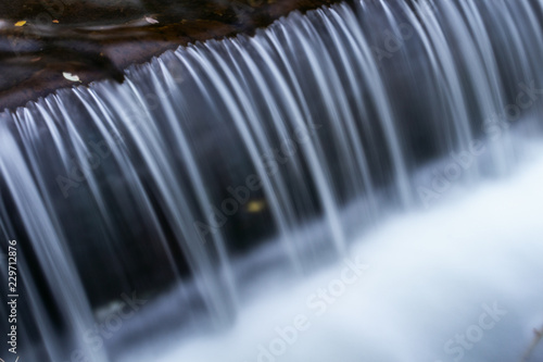 Waterfall mountain view close up. Mountain river waterfall landscape. Waterfall river scene