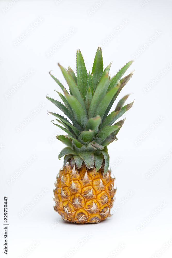 Fototapeta premium Fresh pineapple with leaves. Isolate. On white background. The view from the top
