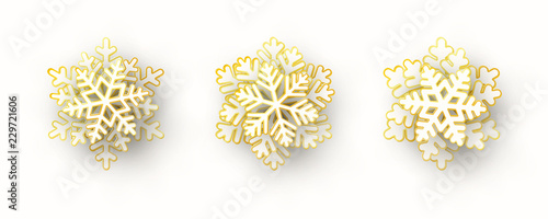 Vector set of 3 white and gold Christmas paper cut 3d snowflakes with shadow isolated on white background. New year and Christmas design elements