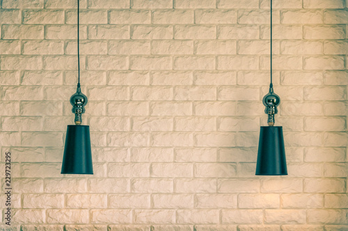 Lampshade on a brick wall background