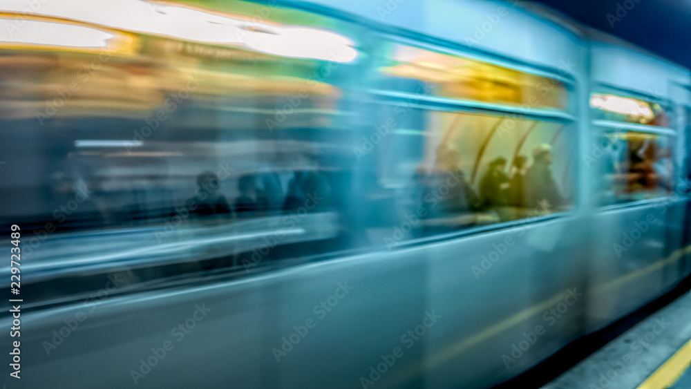 subway train quickly travels along the apron