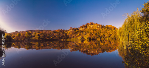 Beautiful landscape Autumn forest and lake in the fall season. © czamfir