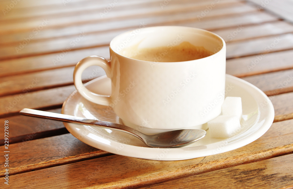 Cup of coffee on table in coffee shop
Cup of coffee on table in coffee shop