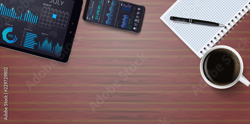 Office table with notepad, laptop, phone and coffee cup .Online statistics and data Analytics.Digital money market, investment, finance and trading. 