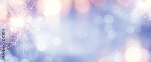Colorful background with sparkler photo