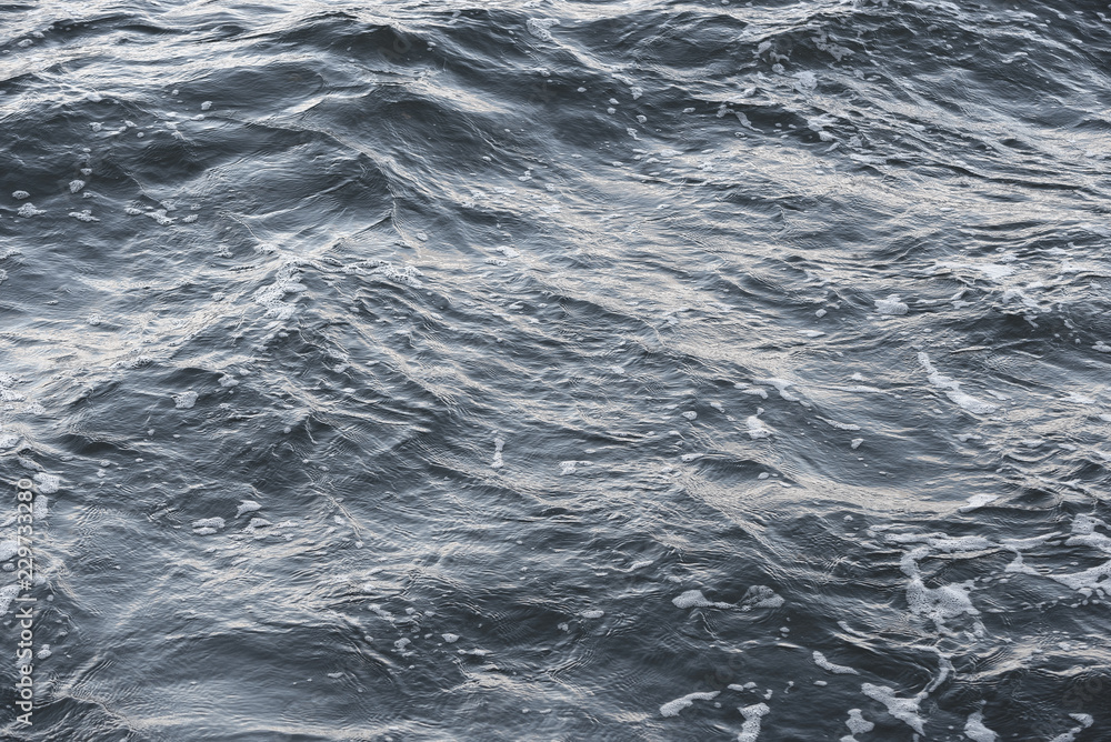 Background texture image of sea water from above copyspace design