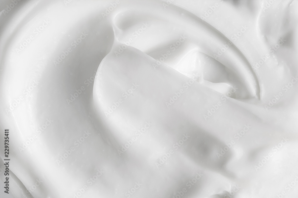 White texture of cosmetic body care cream background White texture of cosmetic body care cream background